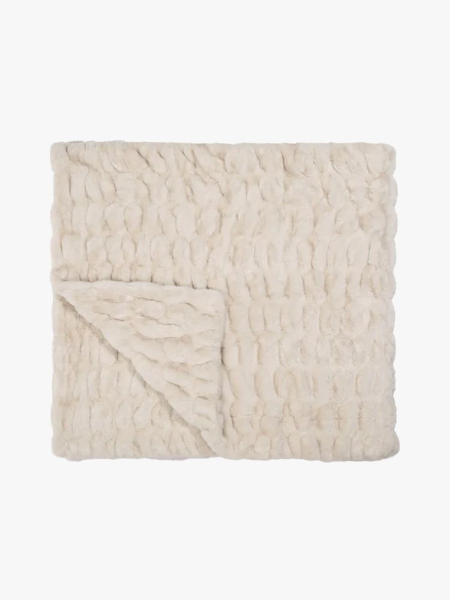 Lola Blanket in Antique Ivory in branded component on a light gray background